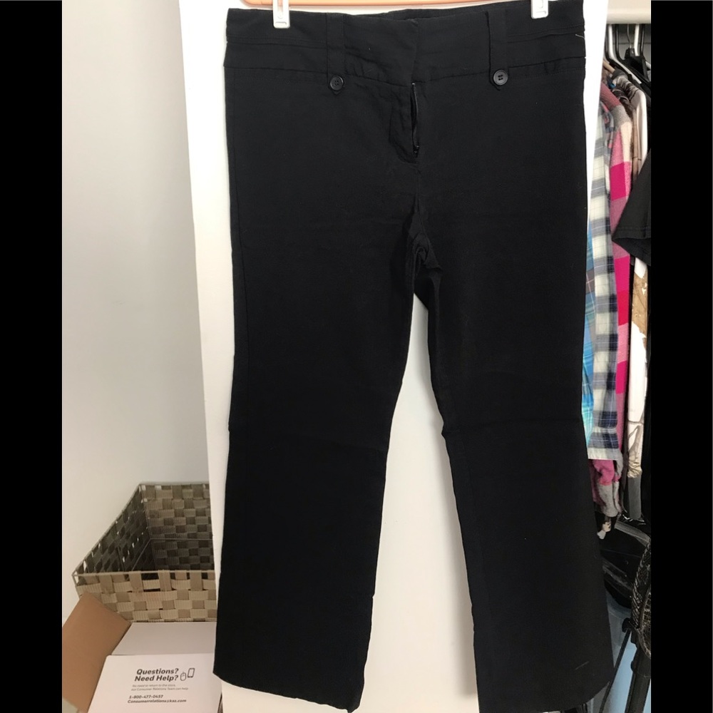 Black dress pants .